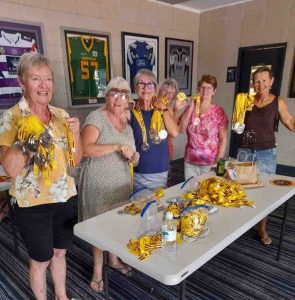 Cooloola Dragons are full of bling at the Queensland Dragon Boat Titles