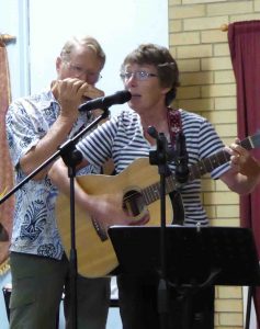  A delightful duo: Len on harmonica and Lay on guitar and vocals