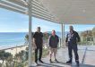 Surf Club General Manager, Ray Holland, Supporters Club President, John Greaney and Surf Club President, Shane Handy take their first walk out on the new verandah.
