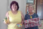 Our lucky hoy winners from Daffodil Day show off their lovely prizes