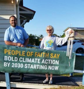 Father William Aupito Iuliano and Maggie Travers, calling for bold climate action by 2030 starting now