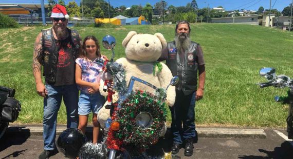Club President Stephen ‘Moose’ Ollier, Keira Powers, and Stephen O’Shea with a giant teddy donated by one of the RBSS students