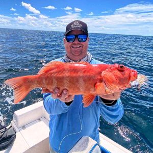 Chris Rippon with a coral trout