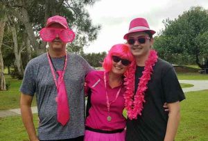 Richard, Shari, and Caden Buczynsky family bonding in pink