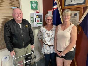 TCB RSL - Karl, Lyndall, and Cheryle are proud of the newly installed defibrillators.
