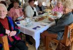Enjoying scones at our 100th birthday celebration