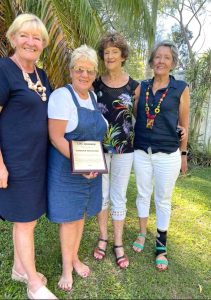 Dragons Boat Club - Sandra Wooster holding her Life Membership Award