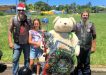 Keira at last year’s run with local MBMMC president Moose and club member Stevo, along with a giant teddy kindly donated by an RBSS student.