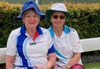 Tin Can Bay Bowls Club’s Susan Kay with a Caboolture visitor