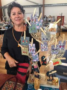 Aida Ghion setting up for the CIRS December markets - image by Fiona Hawthorne