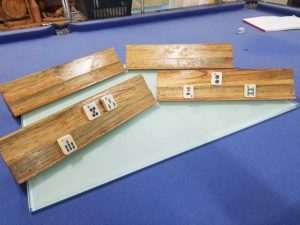 Sets of four of our varnished, wooden Mah-jong boards are now available for purchase at $30/set.