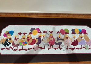 Club President Robyn Salmon made this fun table runner to celebrate club member's birthdays in style!